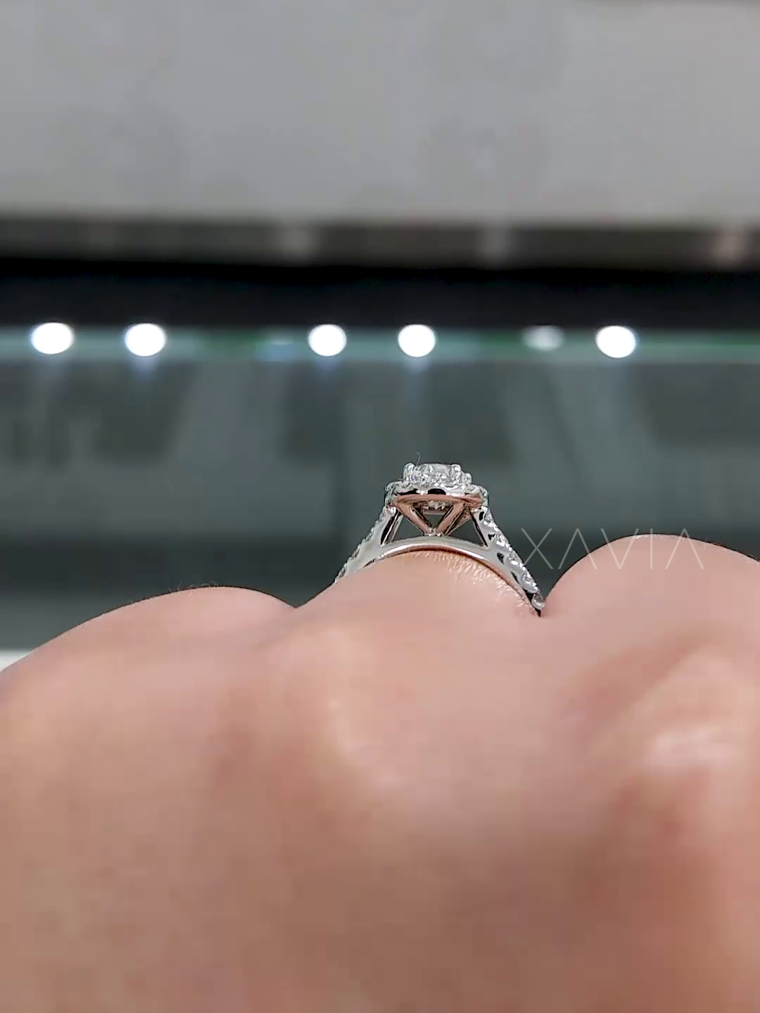 rose gold vintage basket detail under round halo diamond ring