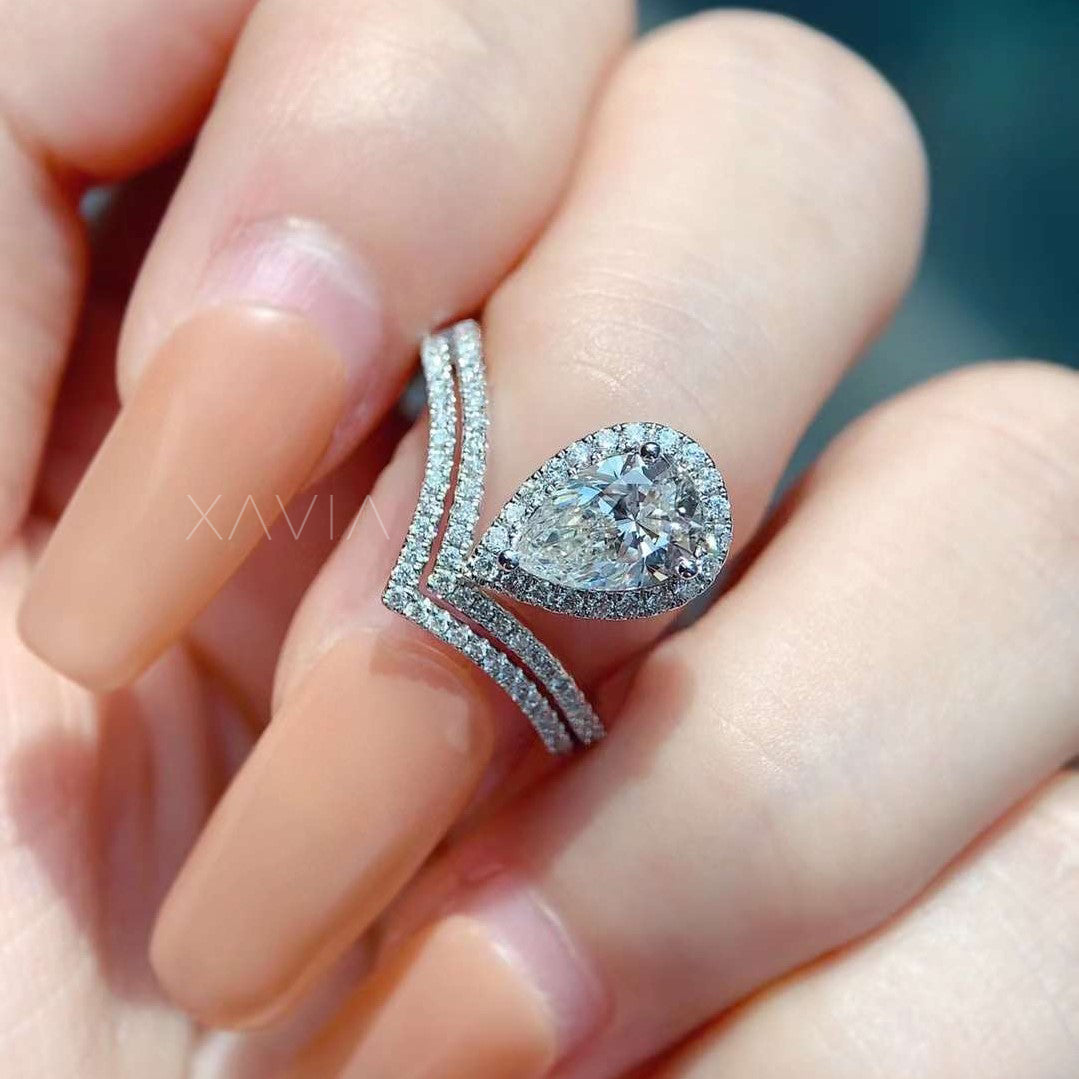 Close-up of round lab diamond with twisted pavé band