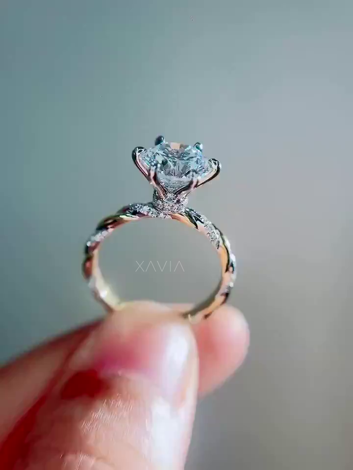 round brilliant lab grown diamond engagement ring with elevated six prong cathedral setting and sculpted twisted pavé diamond band photographed in soft natural lighting