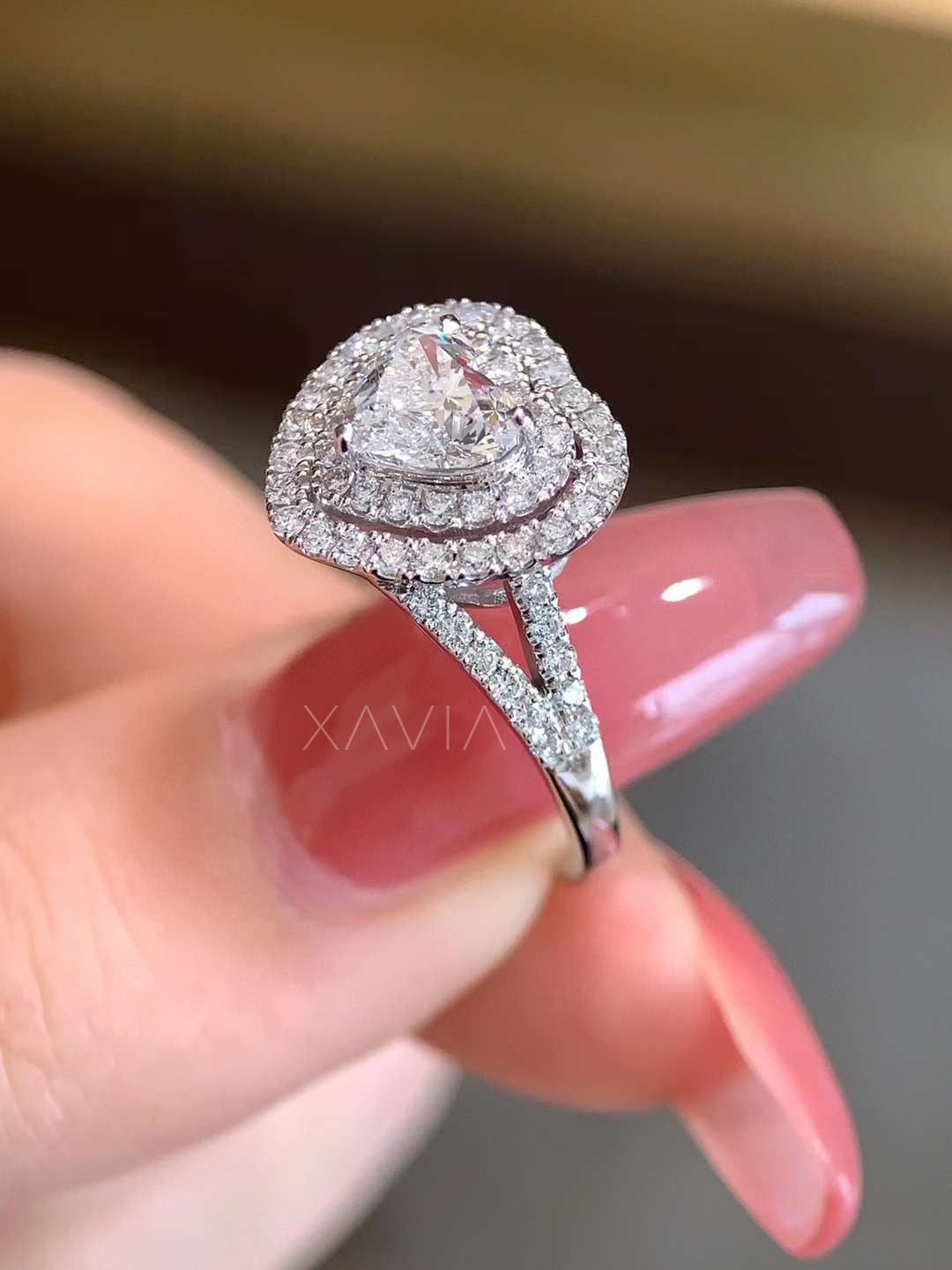 side profile view of heart shaped lab grown diamond ring with double halo and split shank pavé design