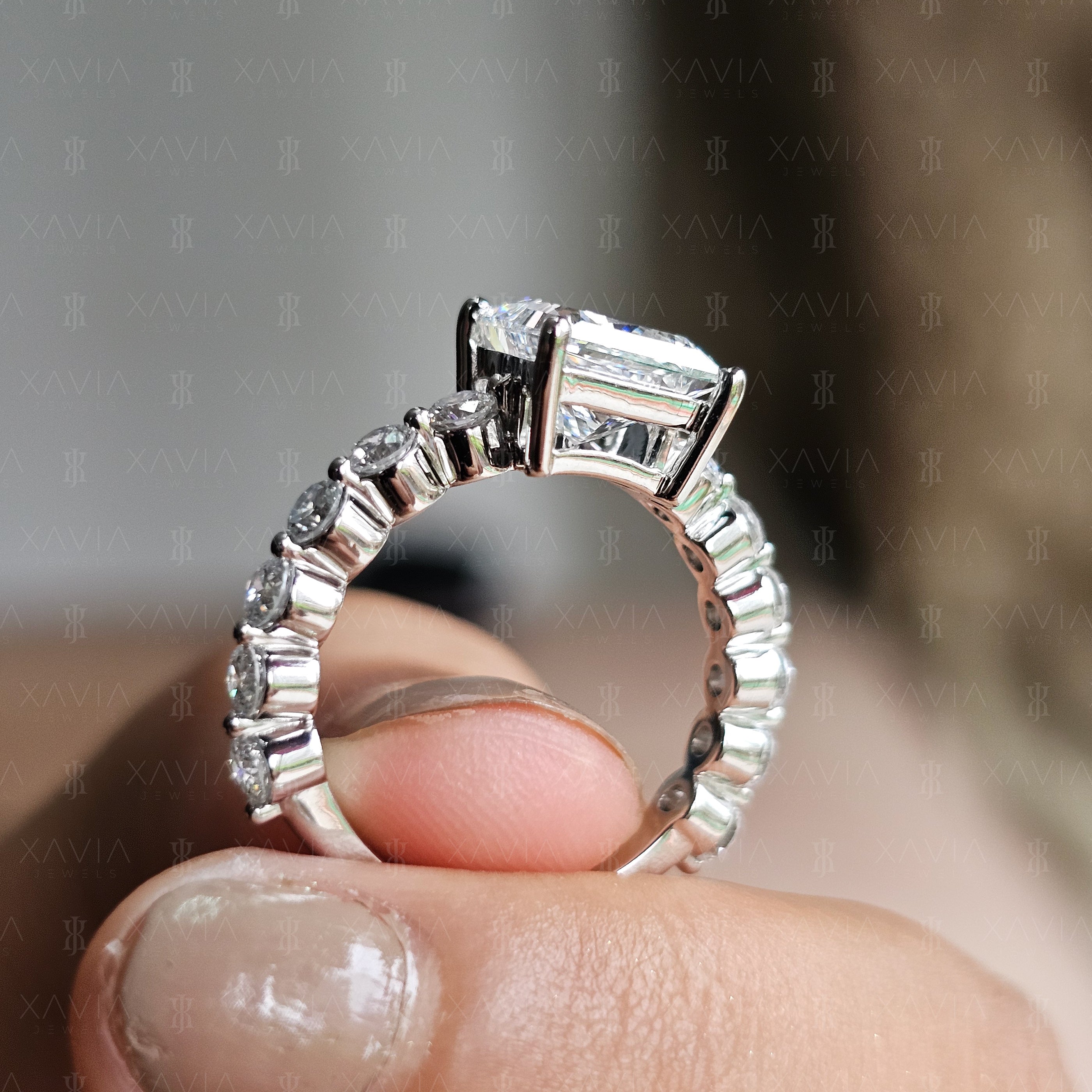 Luxury side gallery view of princess cut lab-grown diamond engagement ring showing open basket structure and continuous diamond eternity setting