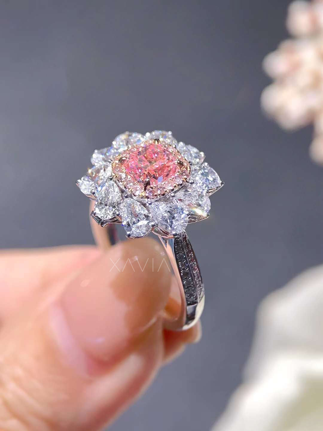 side profile of double halo pink cushion diamond ring with split shank