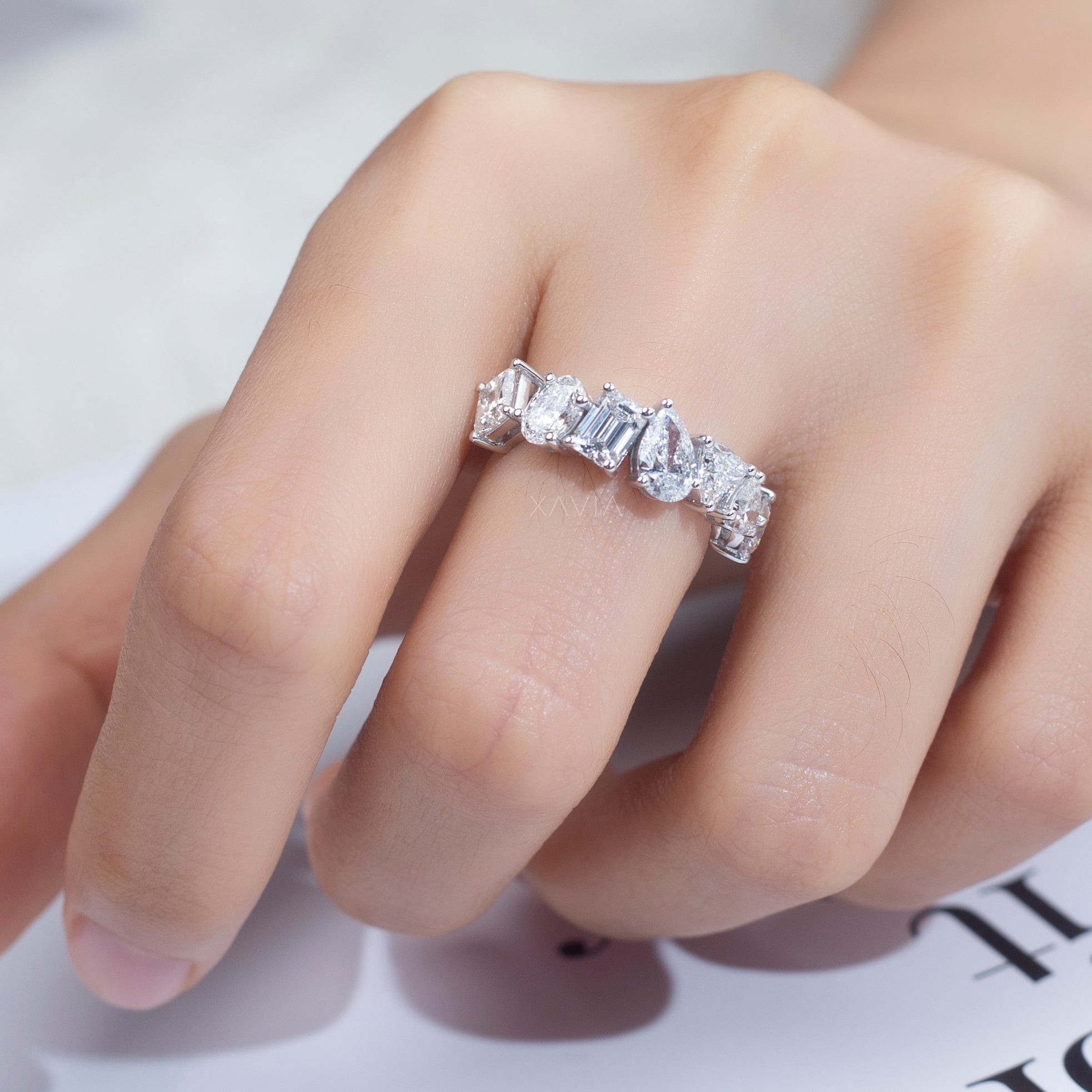 Mixed cut diamond band styled as part of a luxury stack