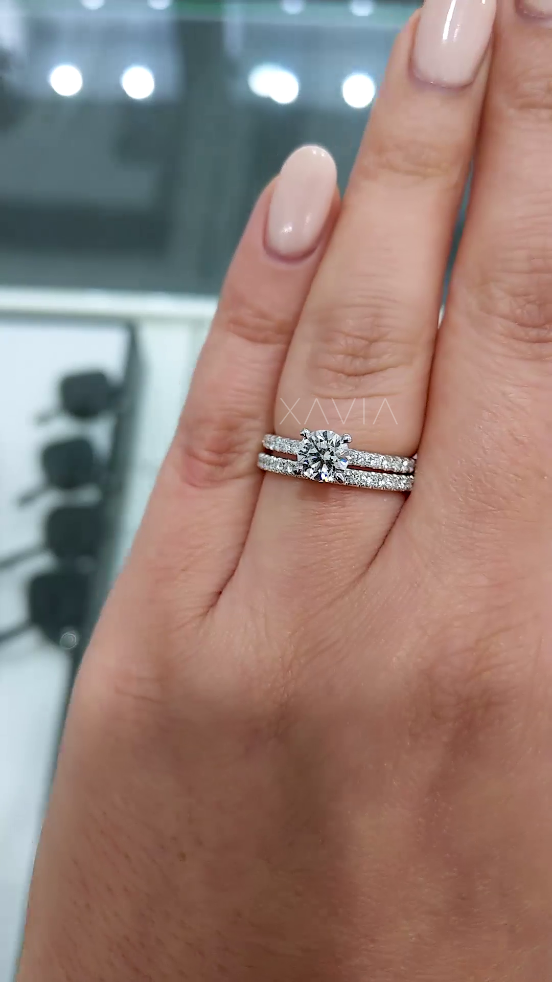 top view of stacked round diamond engagement ring and pavé wedding band showing symmetry, sparkle and refined modern bridal design