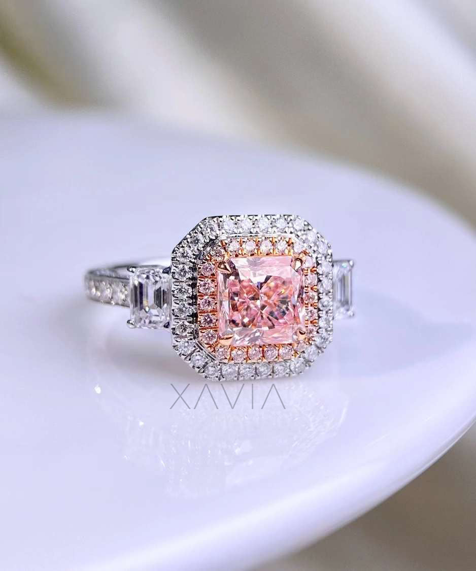top view of radiant pink diamond ring with double halo and white band