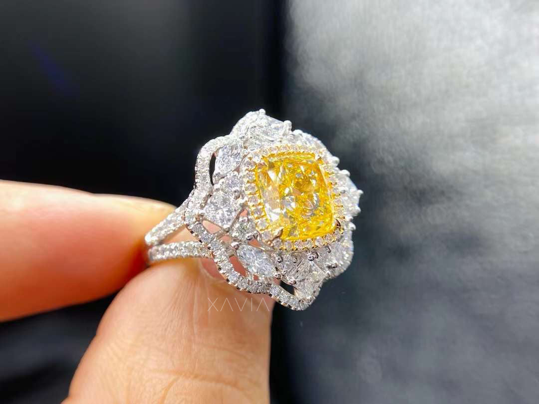 Top view of cushion yellow lab diamond engagement ring with inner halo and marquise floral cluster, displaying symmetrical sparkle and luxury design