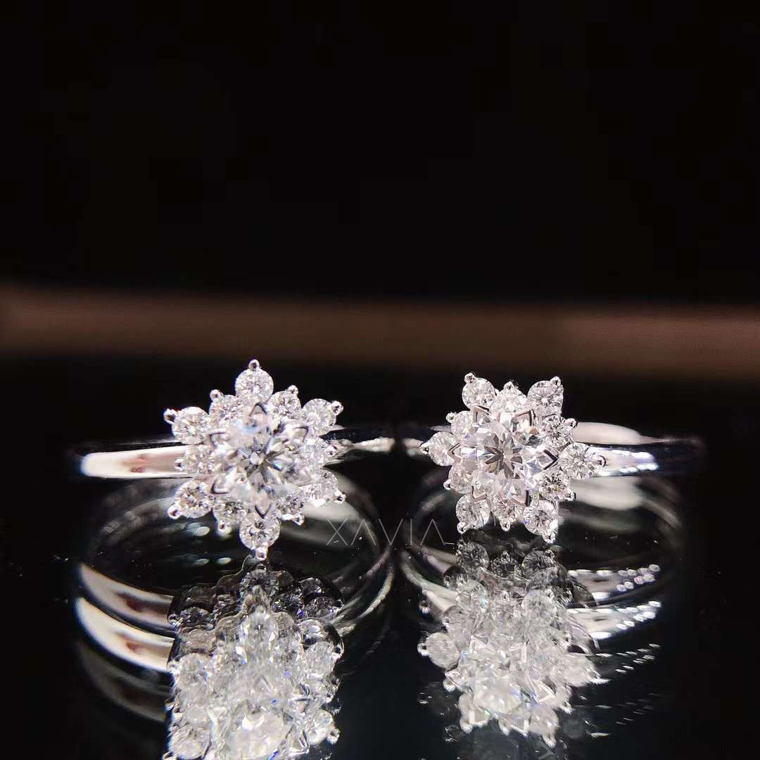 front view of two round brilliant lab grown diamond floral cluster halo rings highlighting symmetrical petal diamond arrangement and bright sparkle