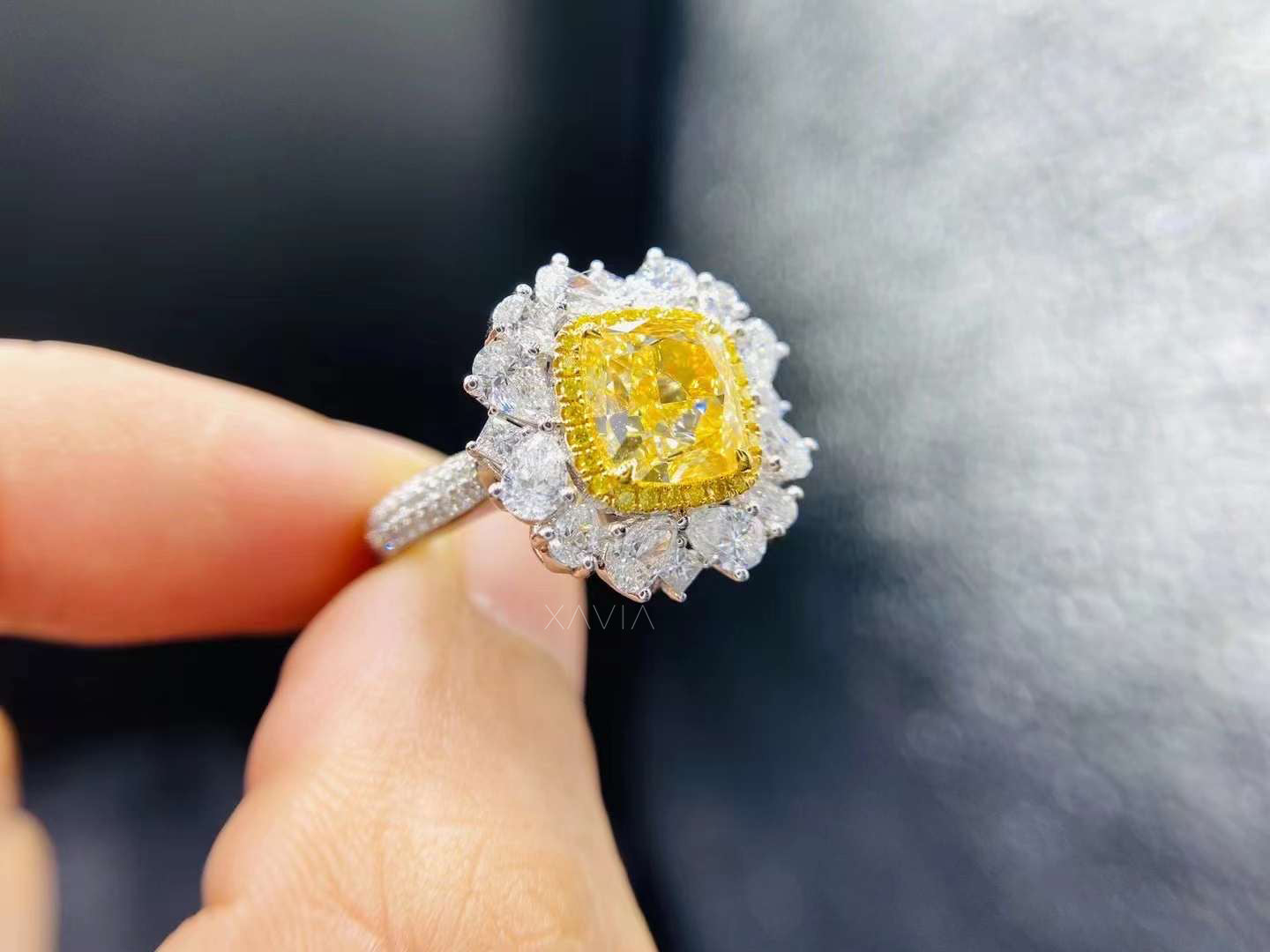 Side profile of Velouria cushion fancy yellow diamond cocktail ring with pavé-set shank and white diamond floral halo cluster