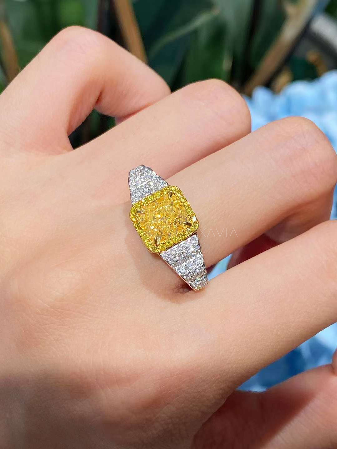 top angle of Zeyora cushion cut fancy yellow lab diamond ring with pavé-set white diamonds in a platinum band