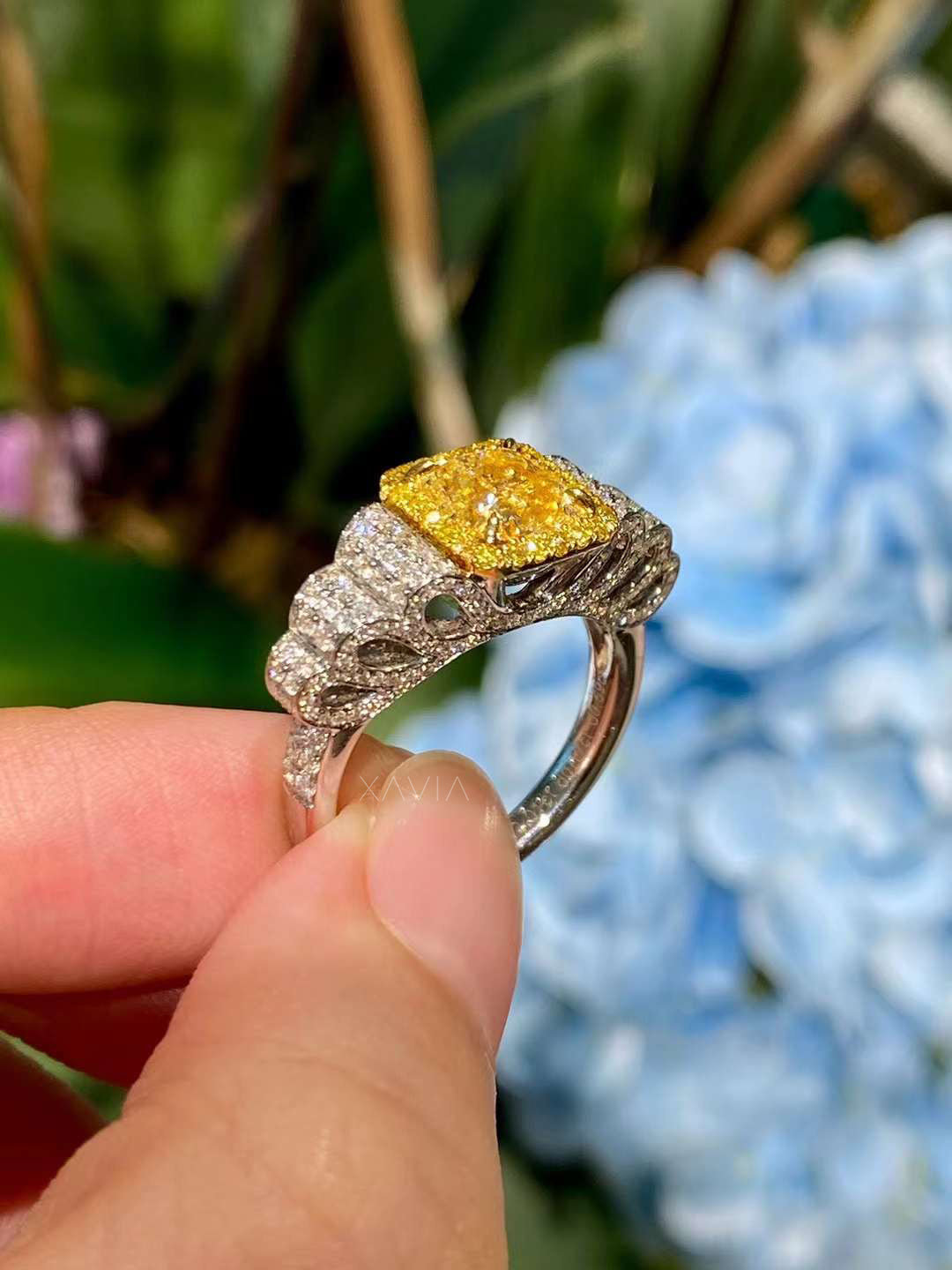angled side profile of Zeyora cushion cut fancy yellow lab diamond cocktail ring with pavé-set white diamond shoulders